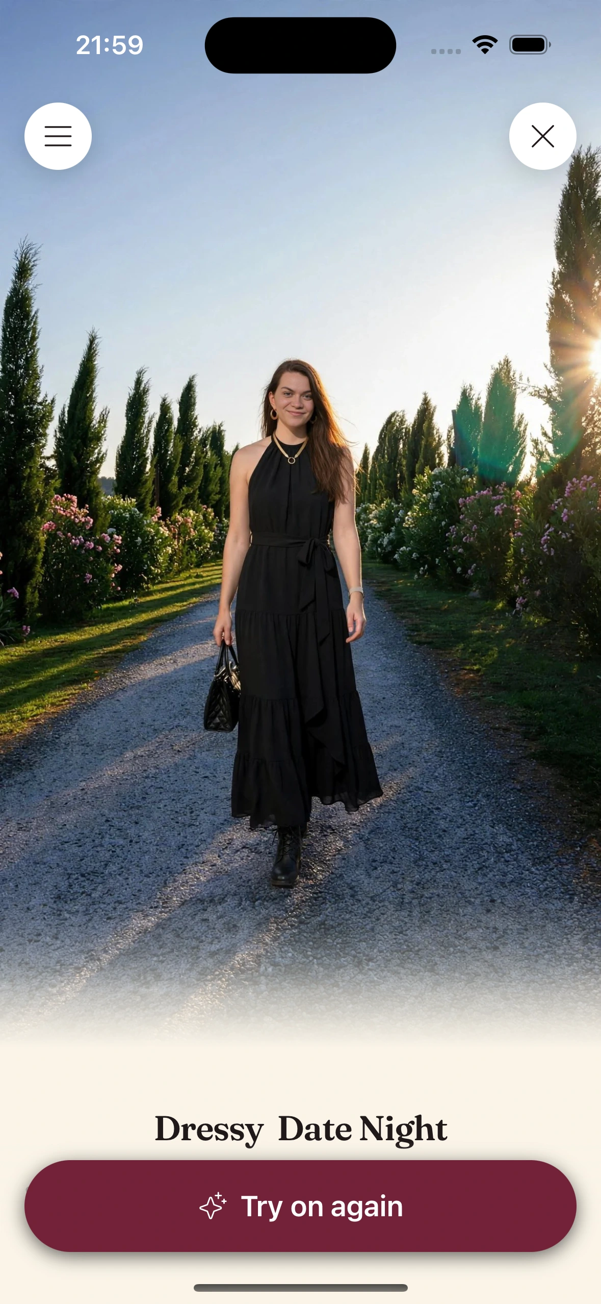 A virtual try-on result in Clottr titled Dressy Date Night: a woman in a black halter maxi dress with a gold necklace and hoop earrings, a black quilted bag and black boots, on a path lined with cypress trees.